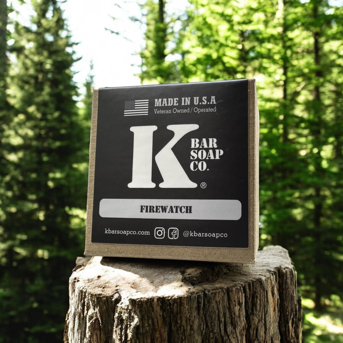 Firewatch cedar bar soap box on a tree stump in the woods