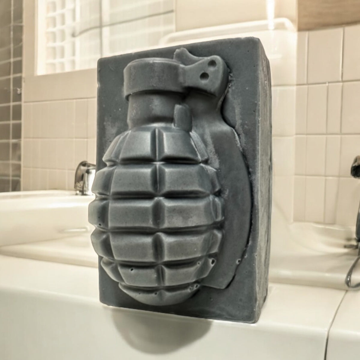 High Speed Low Drag charcoal grenade soap bar on a bathroom sink