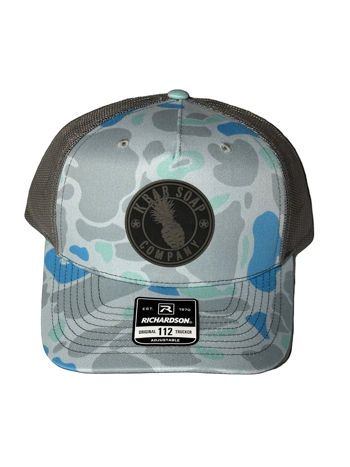 Camouflage trucker hat with brand logos on a white background