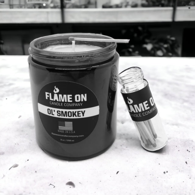 Flame On Black Powder Candle