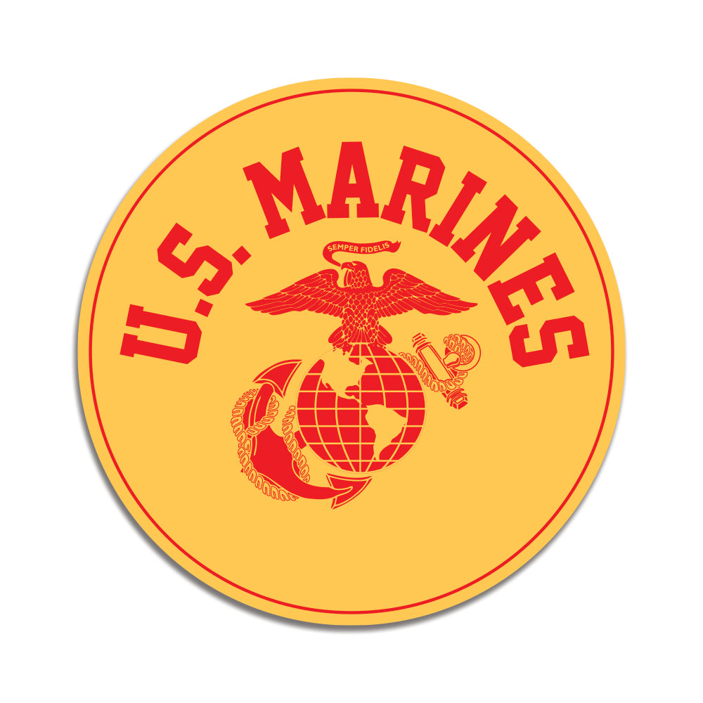 A round gold-colored decal with the U.S. Marines logo and text.