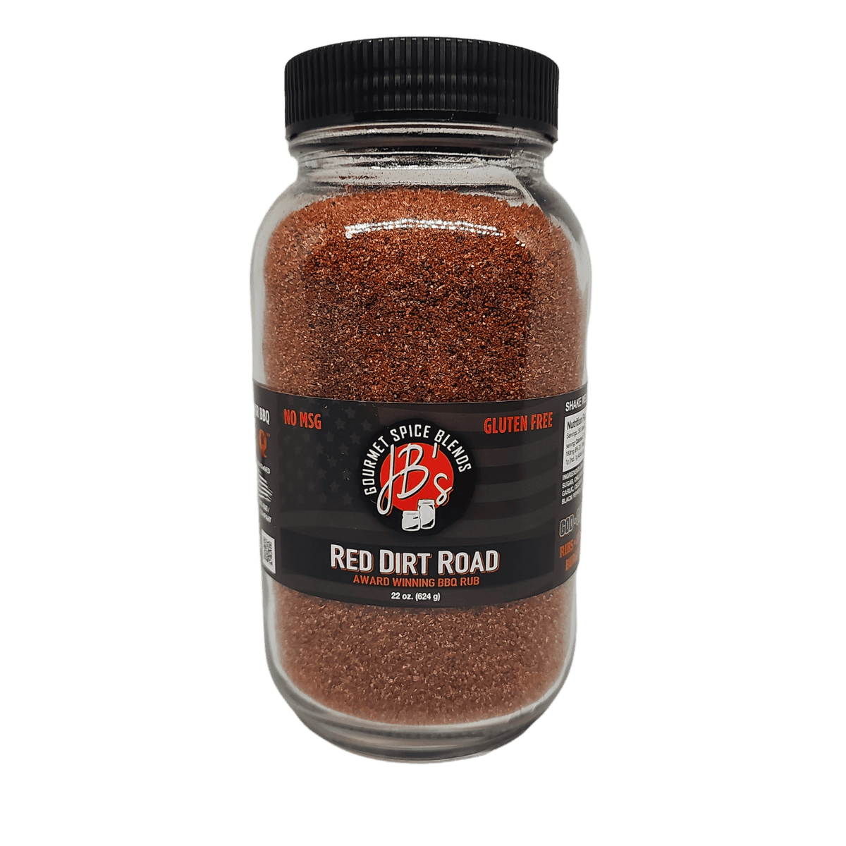 A clear plastic jar filled with reddish-brown spice blend seasoning, sealed with a black screw cap and a black label reading 'Double Dirt Road' and 'Red Dirt Road Seasoned Spice Blend.'.