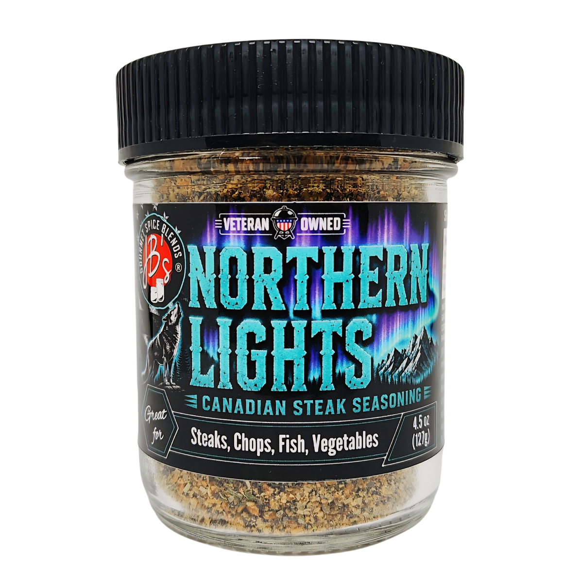 A jar of Northern Lights Canadian Steak Seasoning with a black ribbed lid and a black label featuring teal and purple text, set against a plain white background.