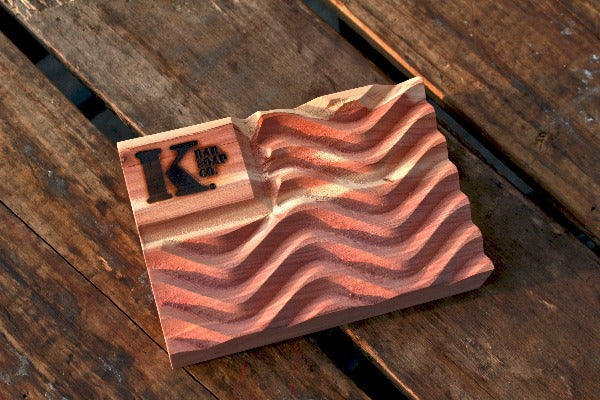 Cedar flag soap dish on wood background