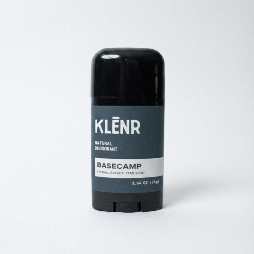 Klenr natural deodorant stick with green label says 'Basecamp'