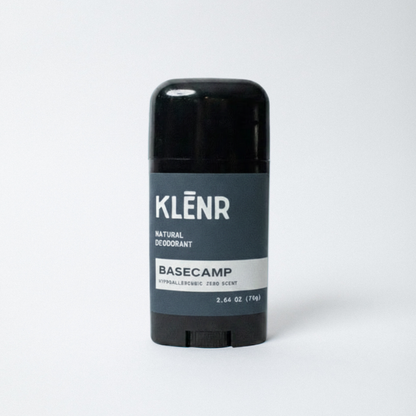Klenr natural deodorant stick with green label says 'Basecamp'