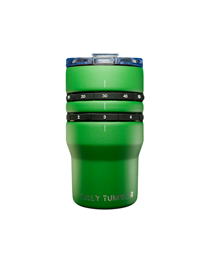 Green tumbler with measurement markings on a white background