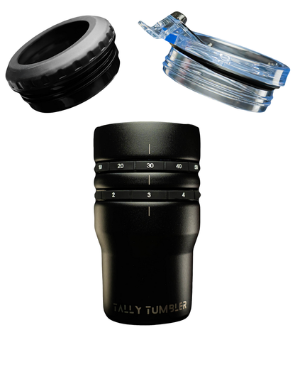 Black tumbler with score measurements on it 