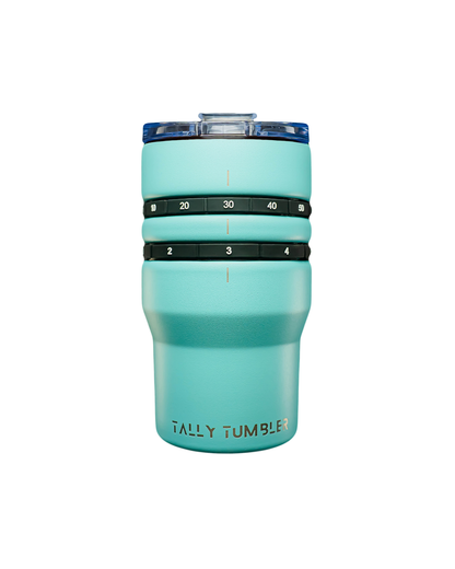 Teal tumbler with measurement markings on a white background