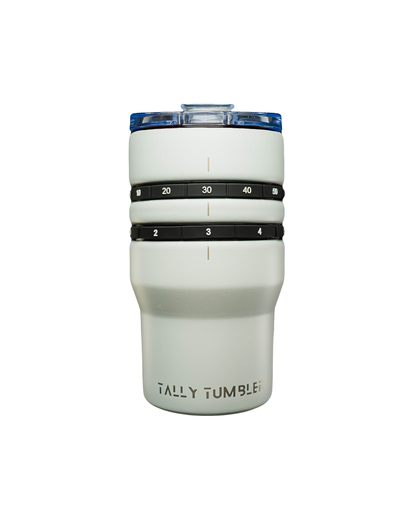 White tumbler with measurement markings on a white background