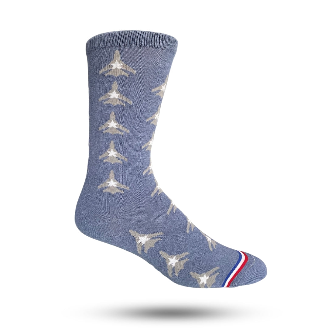 A pair of blue socks with a jet airplane pattern 