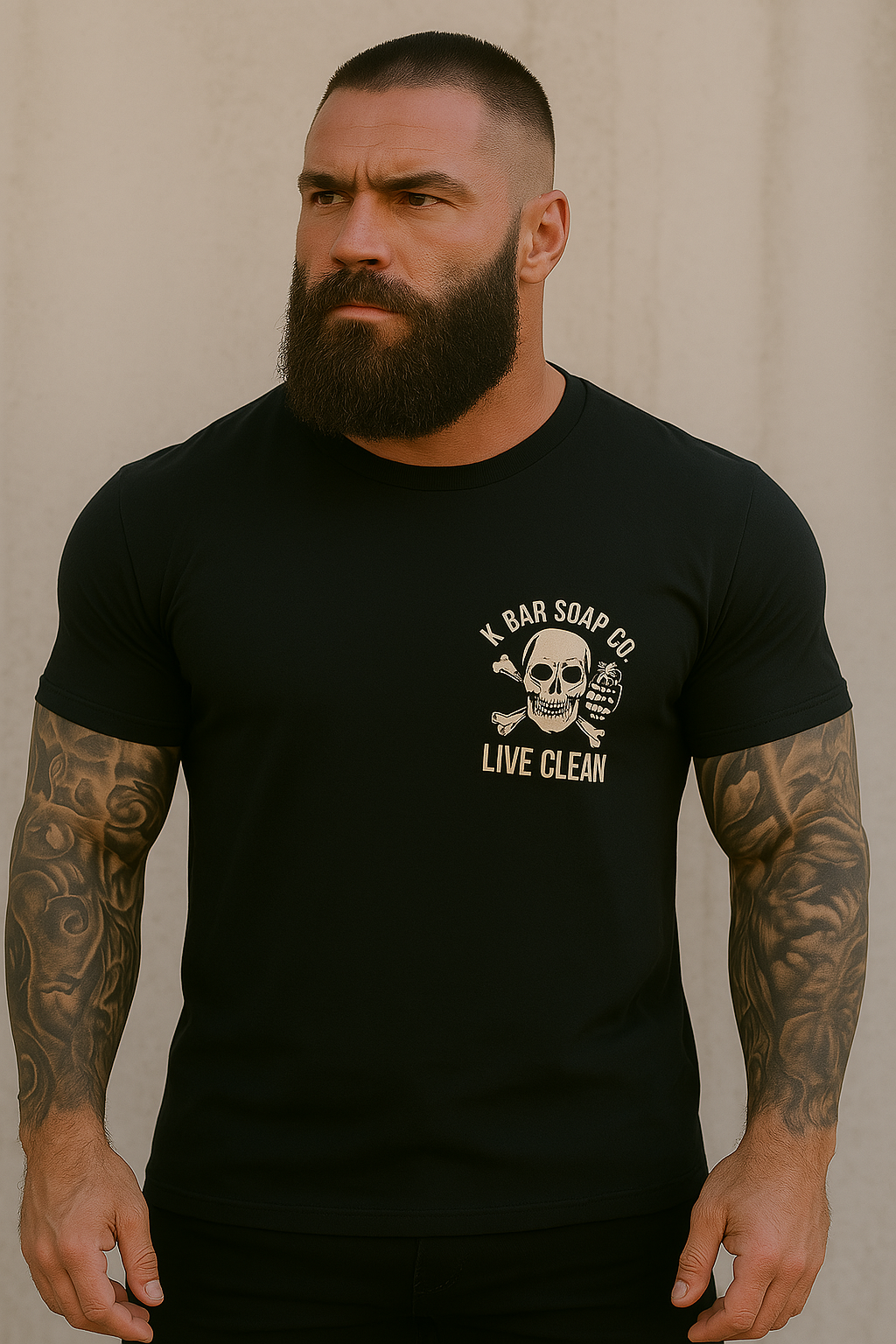 A person wearing a black t-shirt with 'K BAR SOAP CO. LIVE CLEAN' graphic on the back, featuring a skull and crossbones design.
