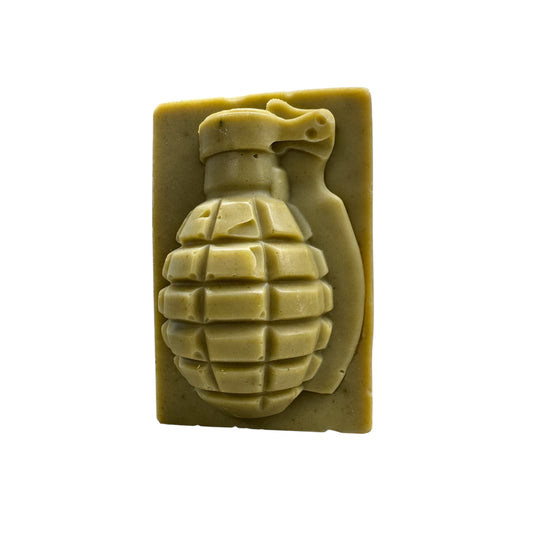 Grenade-shaped soap bar on a white background