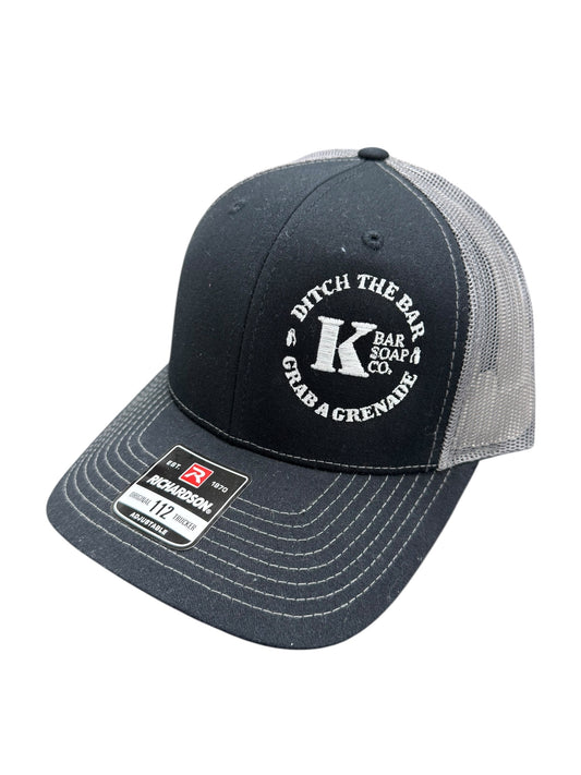 Navy and gray cap with branding on a white background