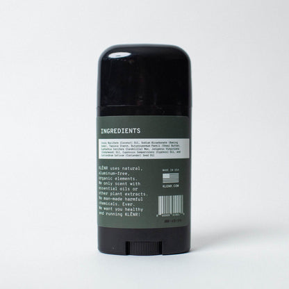 Deodorant stick with an green label showing ingredients