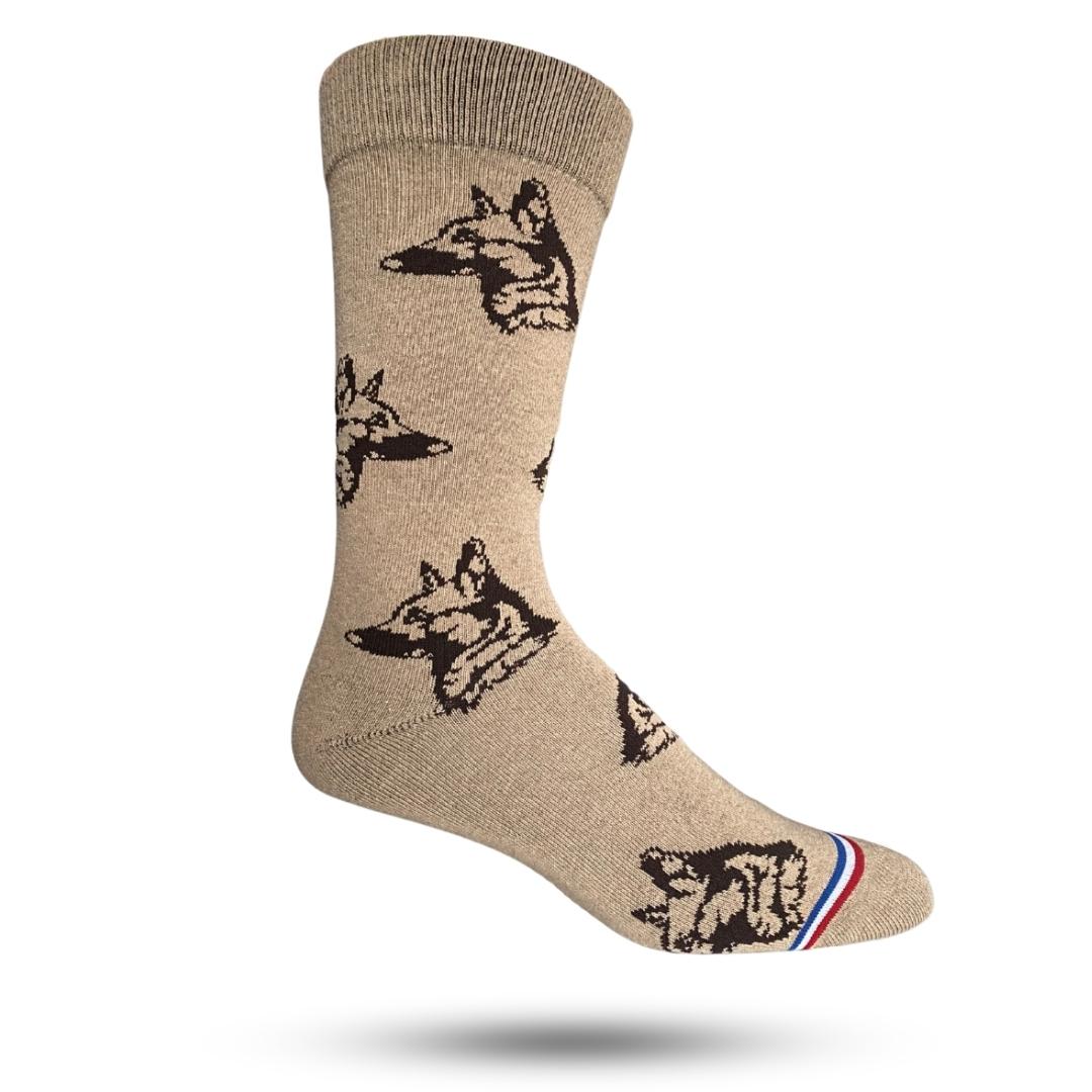 A pair of tan socks with a pattern of silhouetted dog figures and a stripe design, displayed on a single foot
