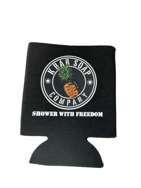 A black drink koozie with a logo and text that reads 'K Bar Soap Co. - SHOWER WITH FREEDOM'.