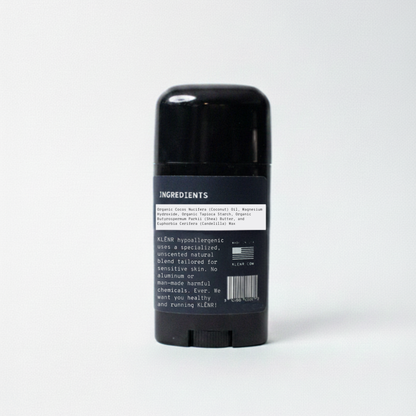 Black deodorant stick with label on a white background