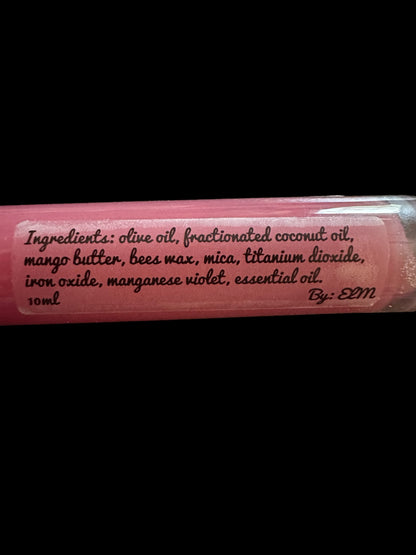 Daisy Chik natural lip gloss tube, close-up of the ingredients label