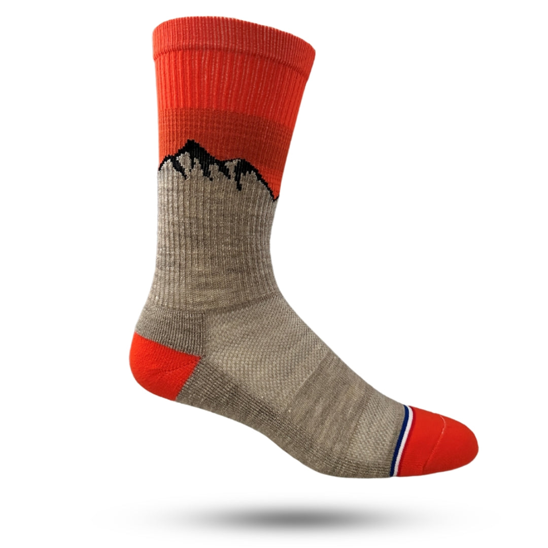 Crew sock with tan mountains and orange background