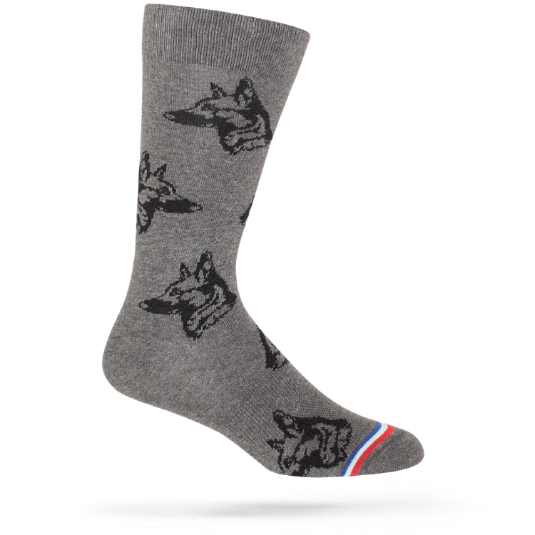 A pair of gray socks with a pattern of silhouetted dog figures and a stripe design, displayed on a single foot.
