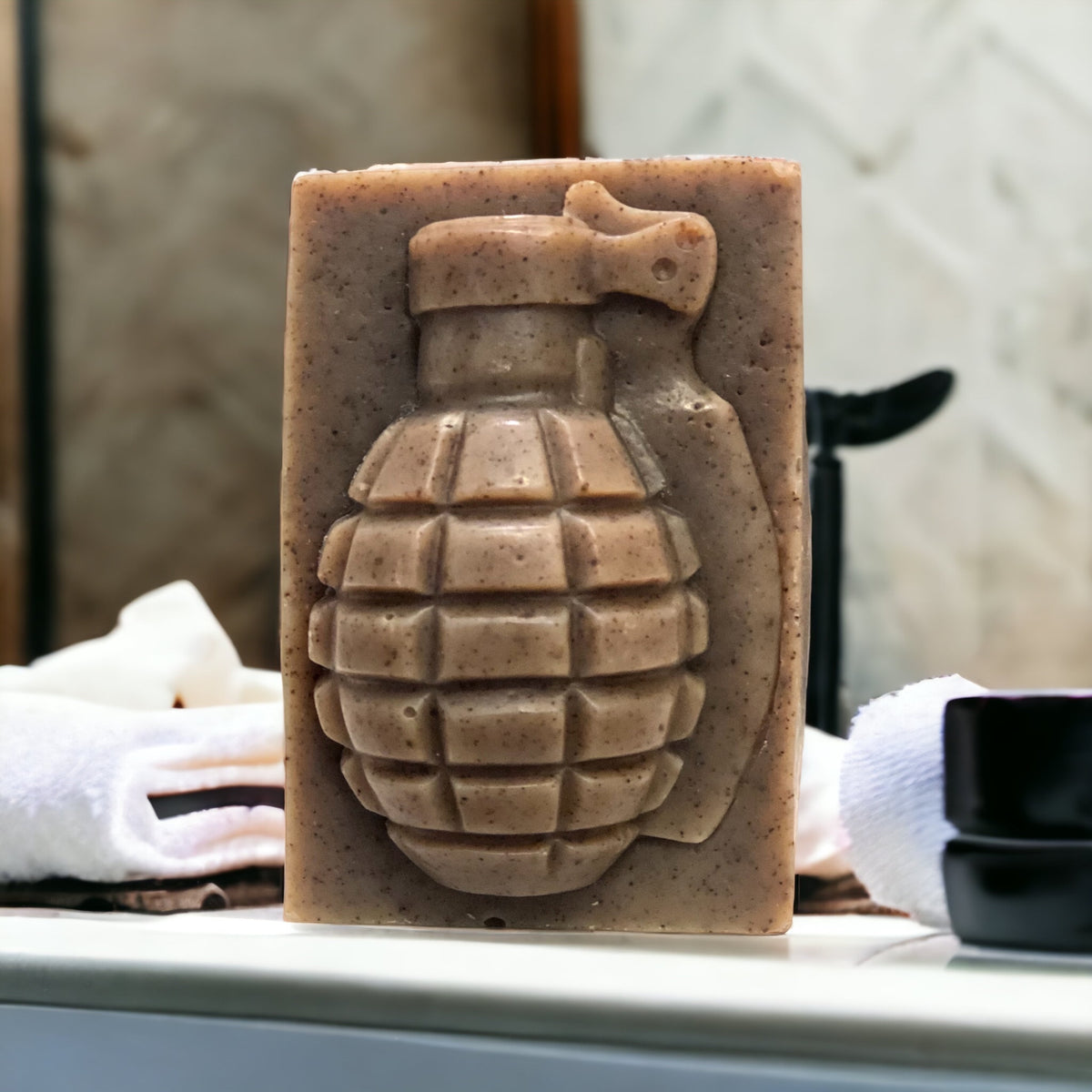 Whiskey & Bad Decisions grenade soap bar on a bathroom counter