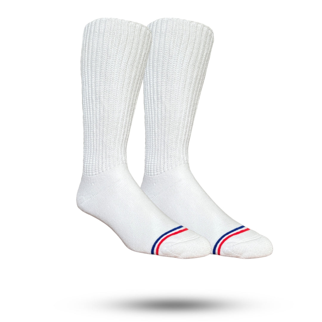 A pair of white non-binding crew socks with a red and blue stripe around foot 