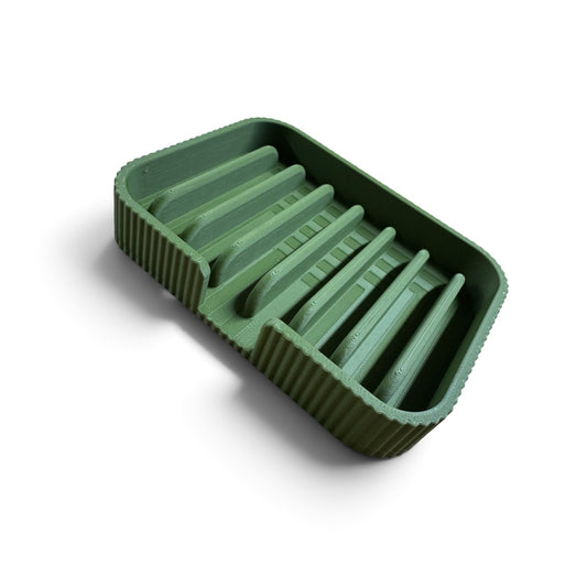 Quonset Hut self-draining soap dish in OD green with raised ribs and drain channel