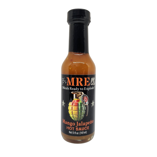 A bottle of MRE's Mango Jalapeño Hot Sauce on a plain white background. The bottle contains an orange-brown sauce and features a black label with a colorful grenade graphic and the brand name MRE's.
