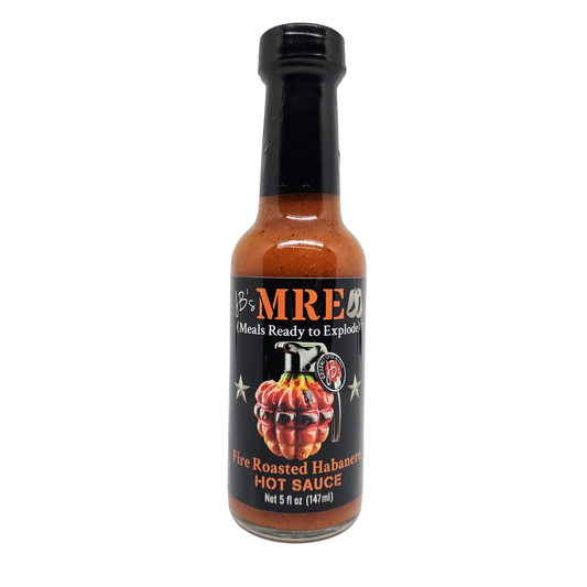 A bottle of JB's MRE Fire Roasted Habanero Hot Sauce on a clean white background. The bottle contains a vibrant orange-red sauce and features a black label with a graphic of a grenade made from habanero peppers and a hand grenade mechanism.