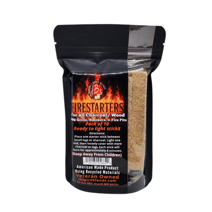 A stand-up pouch of Firestarters wood fire starter sticks by Jagdiblends, featuring a black pouch with a fiery red and orange label and a clear window showing the tan wood sticks inside.