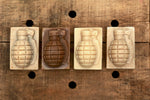 4 pack of grenade soap on wood background