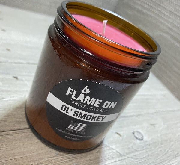 Flame On Ol' Smokey Candle Open on Wood Background