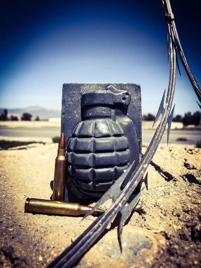Grenade Soap outside in dirt