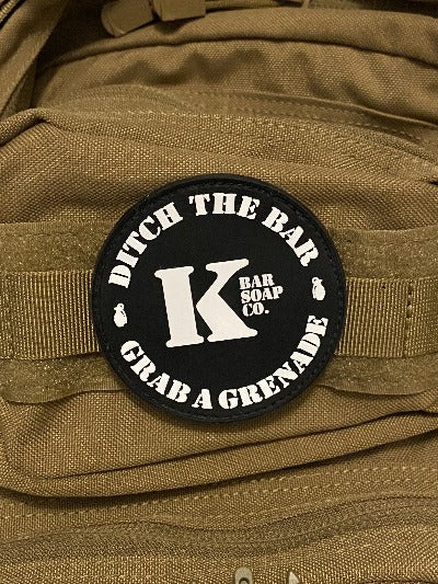 Ditch the Bar Grab a Grenade Logo Patch attached to gear