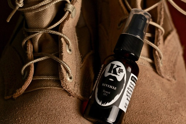 
                  
                    Reveille Beard Oil on top of military boots
                  
                